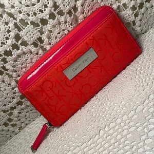 Calvin Klein florescent orange/pink wallet